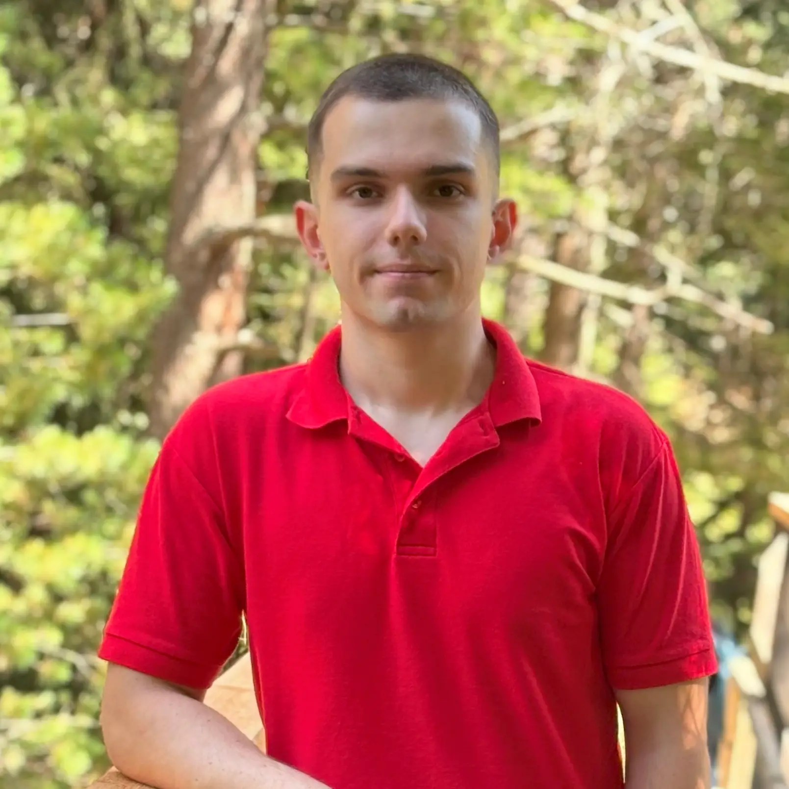 Image of Alexander Peev with a confident smile